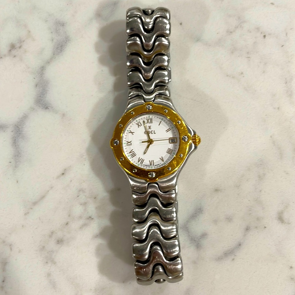 Ebel women’s Sportwave 18KT gold with SS watch